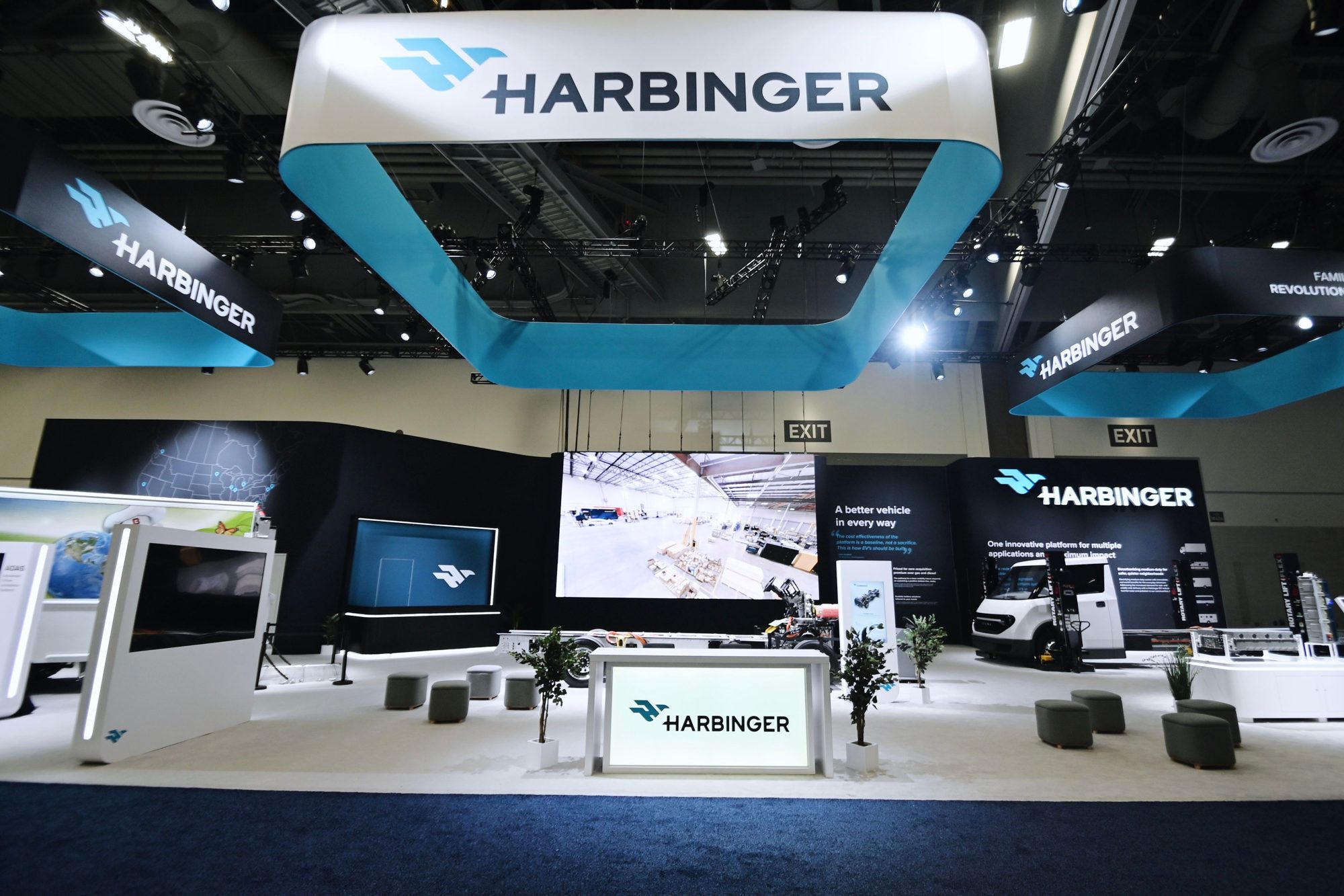 Harbinger 5,500 sq ft booth at ACT Expo with overhead branded ring