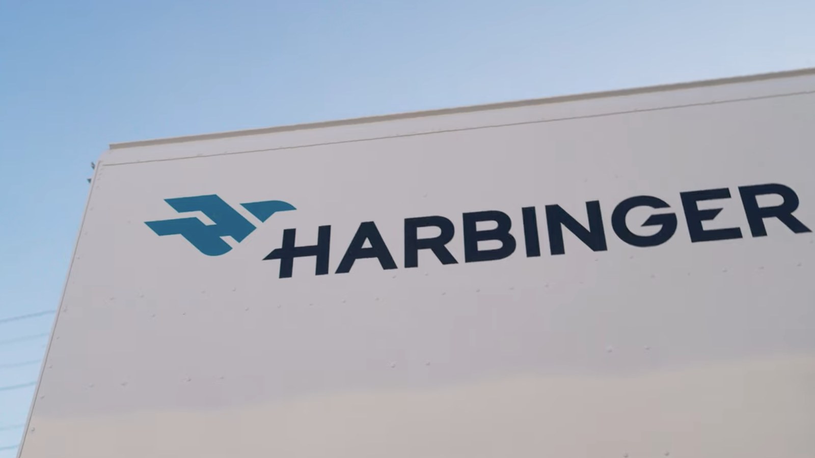Harbinger logo on the side of an electric truck