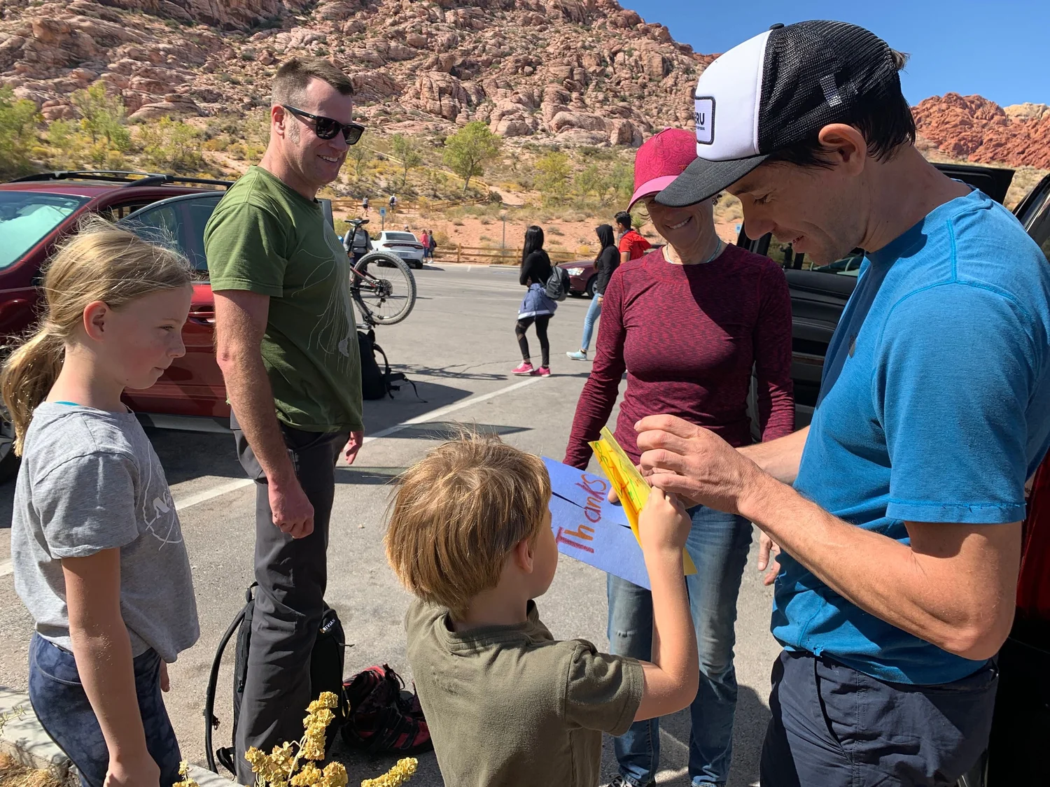 Alex Honnold with Rivian contest winners and their family